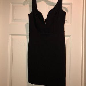 Black Cocktail Dress with Plunging Neckline
